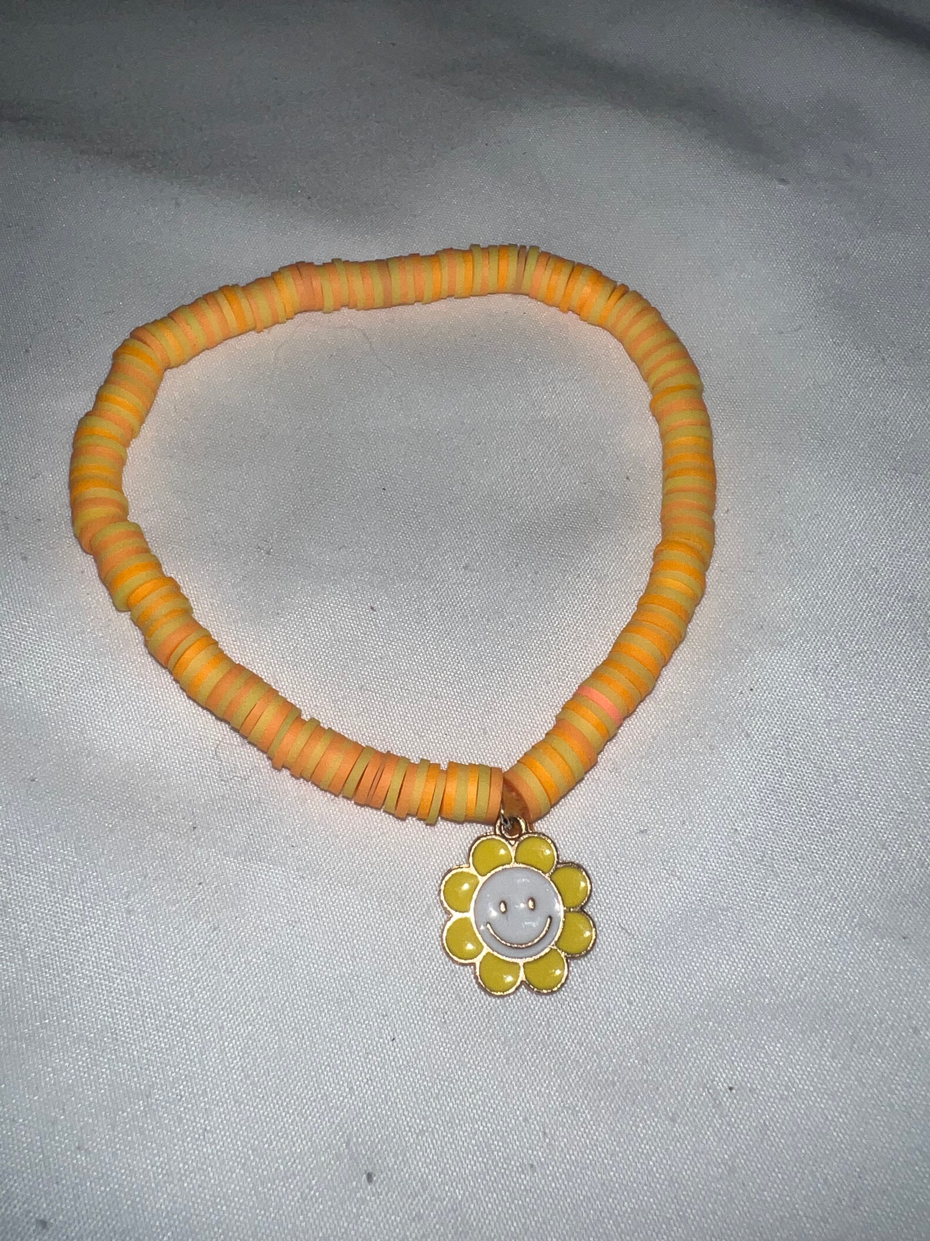 Flower clay face bracelet