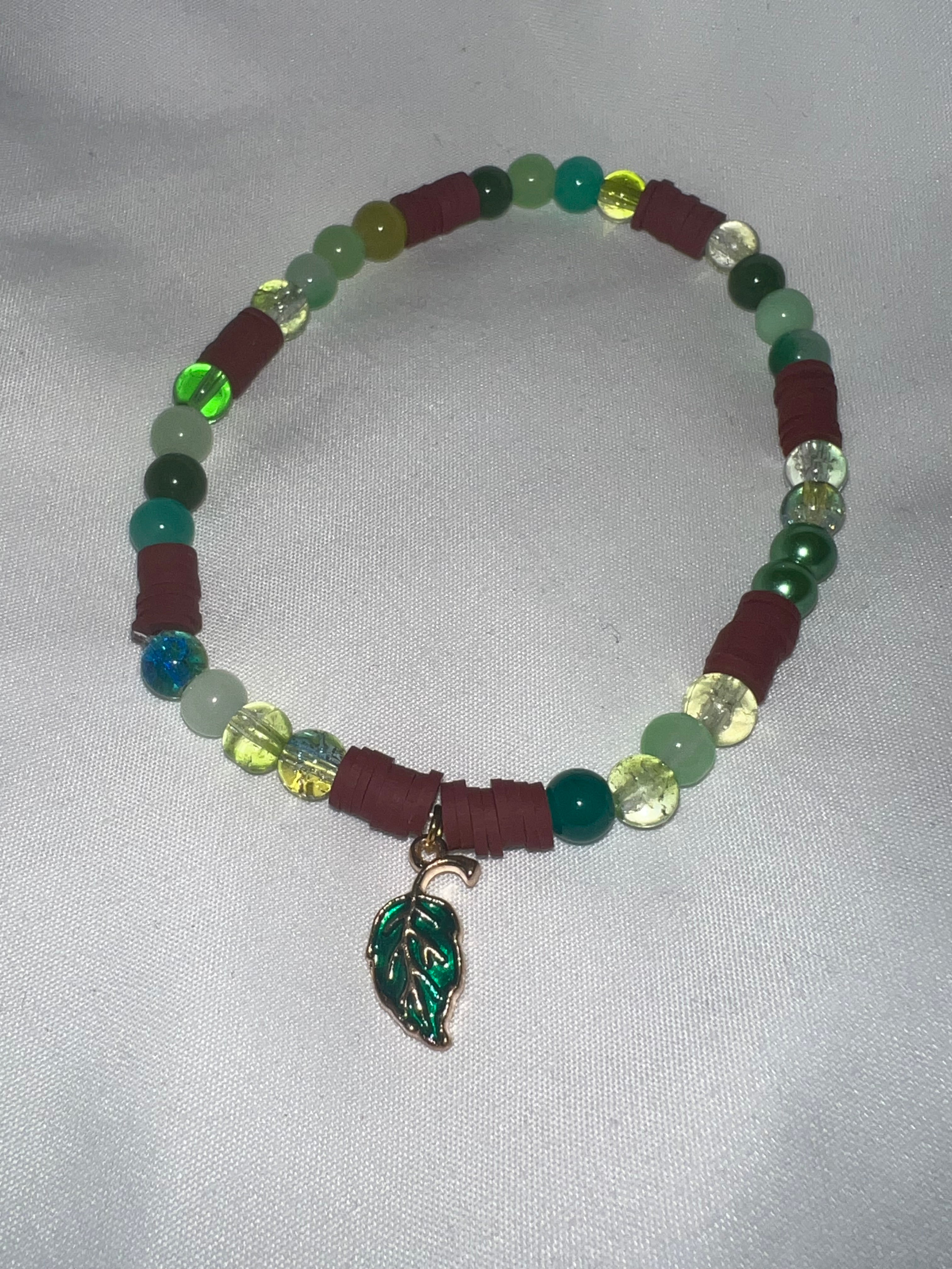 Green leaf clay and glass bead bracelet